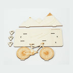 Holz-Mountainbike mit Berg-Silhouette als Geldgeschenk-Ständer, Seitenansicht ohne Geld